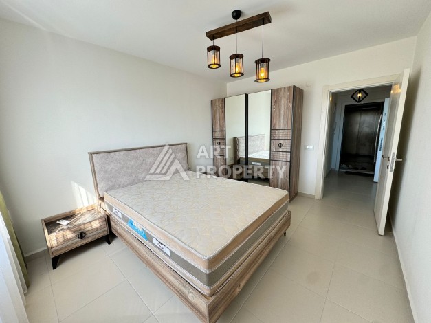 Квартира 1+1 с видом на море в Махмутларе, 70 кв.м. - Ракурс 28