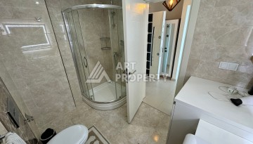 Квартира 1+1 с видом на море в Махмутларе, 70 кв.м. - Ракурс 31