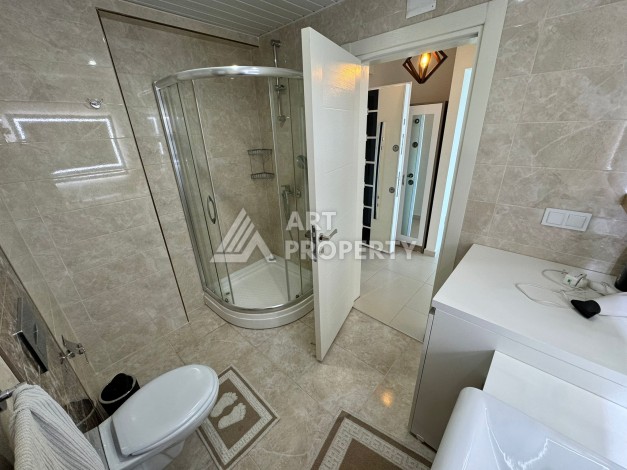 Квартира 1+1 с видом на море в Махмутларе, 70 кв.м. - Ракурс 30