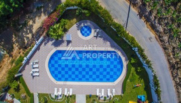 Квартира 1+1 с видом на море в Махмутларе, 70 кв.м. - Ракурс 38