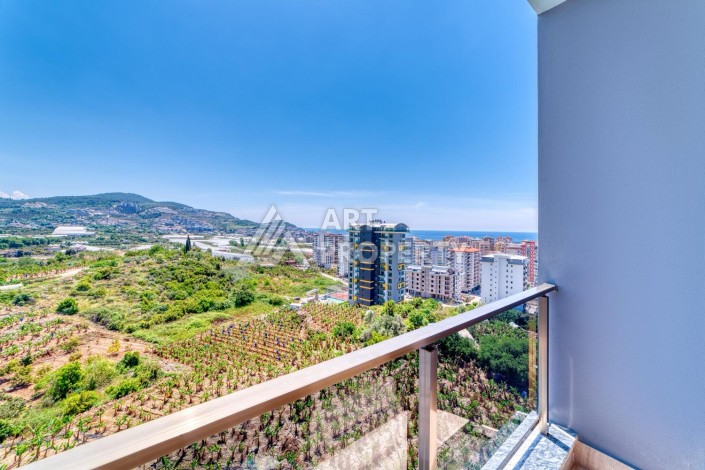 2+1 с полной панорамой на море, крепость и горы — 120 м² на 10 этаже в Махмутларе - Ракурс 11