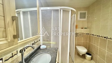 Просторная 2+1 квартира 110 м² на 9 этаже с панорамным видом на море и крепость, в 70 метрах от пляжа, с бассейном и развитой инфраструктурой - Ракурс 5