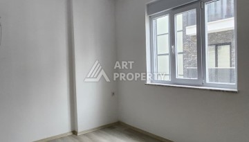 Уютная квартира 1+1 в Махмутларе, 55 м², 3 этаж, комплекс с бассейном - Ракурс 2