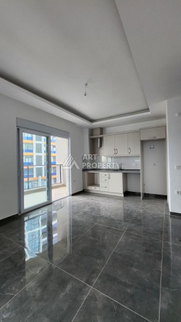 Уютная квартира 1+1 в Махмутларе, 55 м², 3 этаж, комплекс с бассейном - Ракурс 0