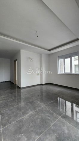 Уютная квартира 1+1 в Махмутларе, 55 м², 3 этаж, комплекс с бассейном - Ракурс 2