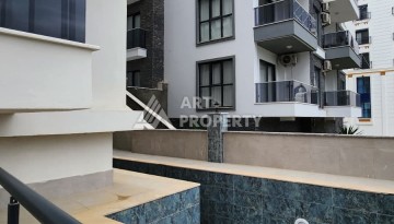 Уютная квартира 1+1 в Махмутларе, 55 м², 3 этаж, комплекс с бассейном - Ракурс 6