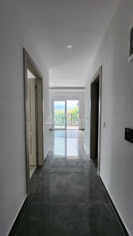 Уютная квартира 1+1 в Махмутларе, 55 м², 3 этаж, комплекс с бассейном - Ракурс 7