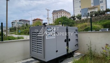 Уютная квартира 1+1 в Махмутларе, 55 м², 3 этаж, комплекс с бассейном - Ракурс 12