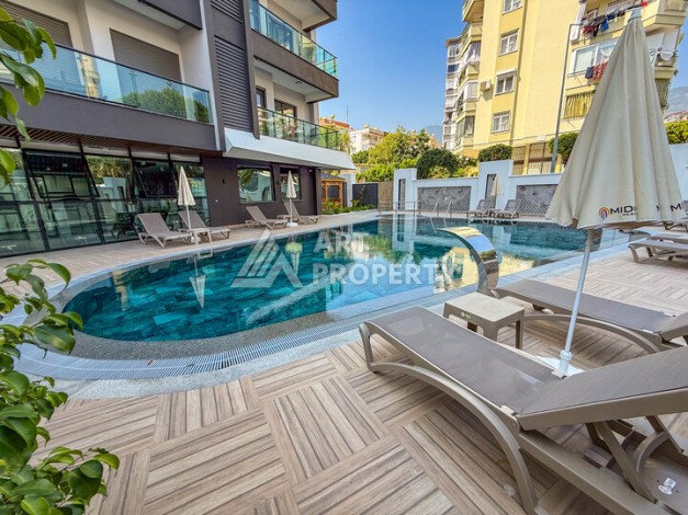 Квартира 1+1 в центре Алании, 58 кв.м - Ракурс 1