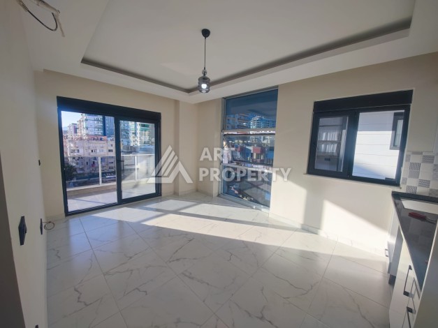 Квартира 1+1 в районе Махмутлар, всего 300м к морю - Ракурс 1