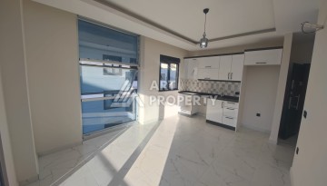 Квартира 1+1 в районе Махмутлар, всего 300м к морю - Ракурс 3