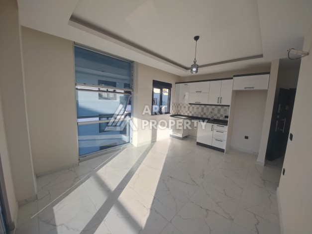 Квартира 1+1 в районе Махмутлар, всего 300м к морю - Ракурс 2