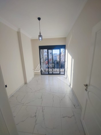 Квартира 1+1 в районе Махмутлар, всего 300м к морю - Ракурс 6