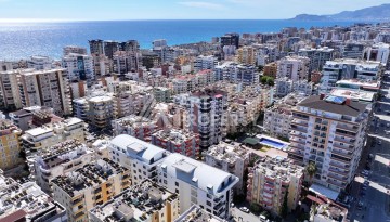 Квартира 1+1 в районе Махмутлар, всего 300м к морю - Ракурс 19