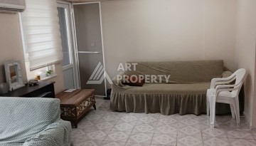 Меблированная квартира 1+1, 65 м², 4 этаж, 250 м до моря в Махмутларе. - Ракурс 9