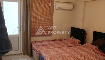 Меблированная квартира 1+1, 65 м², 4 этаж, 250 м до моря в Махмутларе. - Ракурс 18