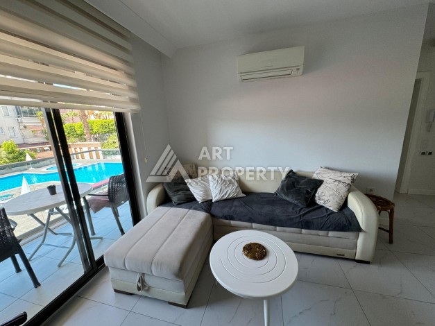 Квартира 1+1, 58 м², меблированная, с видом на бассейн и инфраструктурой комплекса - Ракурс 0