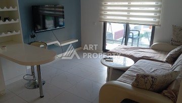 Квартира 1+1, 58 м², меблированная, с видом на бассейн и инфраструктурой комплекса - Ракурс 5