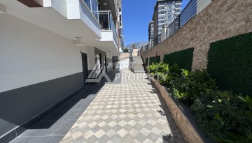 Современный дуплекс 2+1 в комплексе в районе Махмутлар. - Ракурс 14