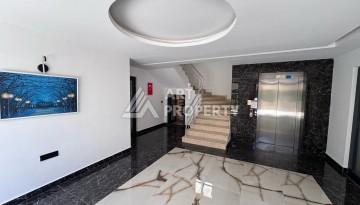 Современный дуплекс 2+1 в комплексе в районе Махмутлар. - Ракурс 16