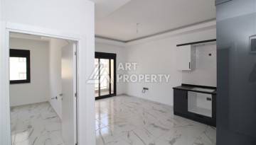 Новая квартира 1+1 в современном доме в районе Махмутлар — 500 м до моря. - Ракурс 1