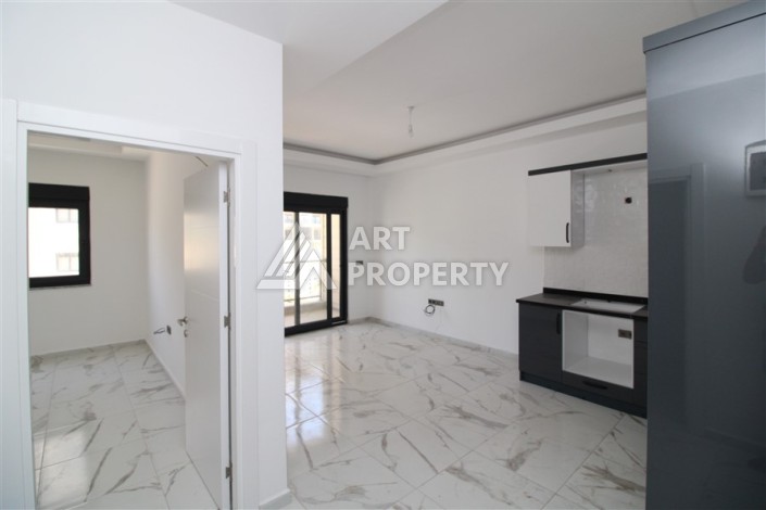 Новая квартира 1+1 в современном доме в районе Махмутлар — 500 м до моря. - Ракурс 0