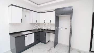 Новая квартира 1+1 в современном доме в районе Махмутлар — 500 м до моря. - Ракурс 2