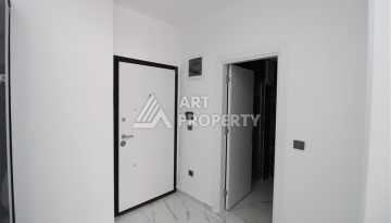 Новая квартира 1+1 в современном доме в районе Махмутлар — 500 м до моря. - Ракурс 3