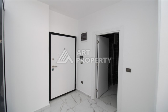 Новая квартира 1+1 в современном доме в районе Махмутлар — 500 м до моря. - Ракурс 2