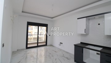 Новая квартира 1+1 в современном доме в районе Махмутлар — 500 м до моря. - Ракурс 4