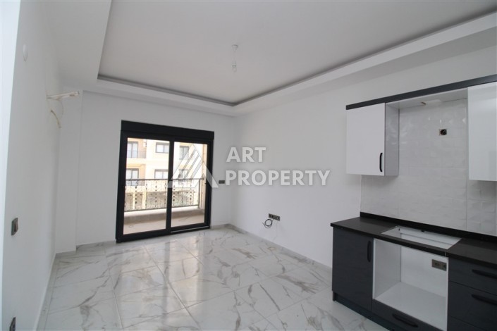 Новая квартира 1+1 в современном доме в районе Махмутлар — 500 м до моря. - Ракурс 3