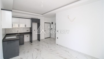 Новая квартира 1+1 в современном доме в районе Махмутлар — 500 м до моря. - Ракурс 6