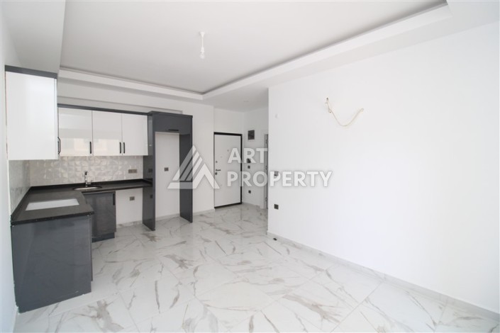 Новая квартира 1+1 в современном доме в районе Махмутлар — 500 м до моря. - Ракурс 5