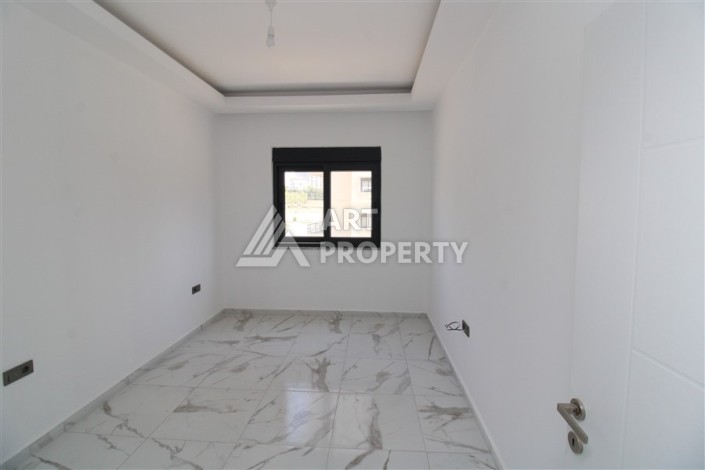 Новая квартира 1+1 в современном доме в районе Махмутлар — 500 м до моря. - Ракурс 6