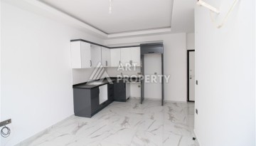 Новая квартира 1+1 в современном доме в районе Махмутлар — 500 м до моря. - Ракурс 8