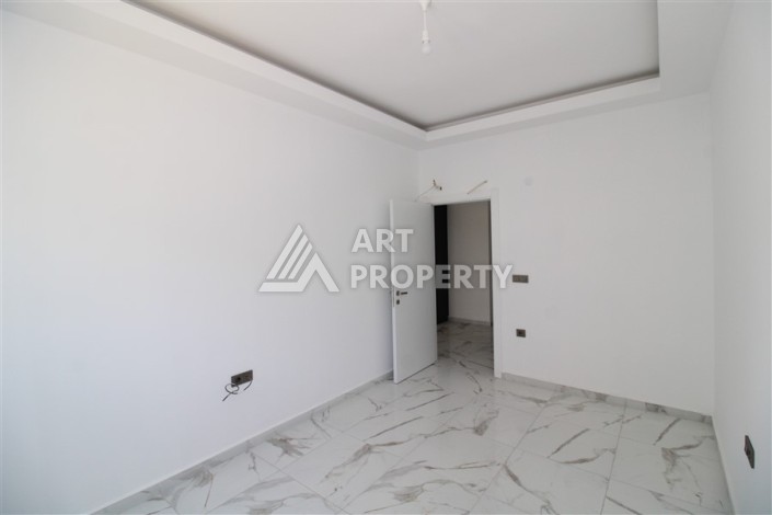 Новая квартира 1+1 в современном доме в районе Махмутлар — 500 м до моря. - Ракурс 8