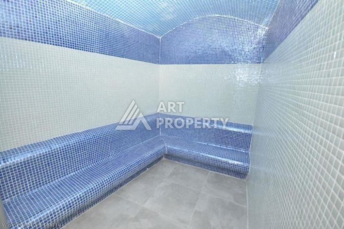 Просторная меблированная квартира 2+1 в элитном комплексе в районе Каргыджак — 300 метров до моря. - Ракурс 12