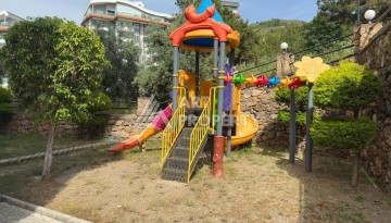 Просторная меблированная квартира 2+1 в элитном комплексе в районе Каргыджак — 300 метров до моря. - Ракурс 14