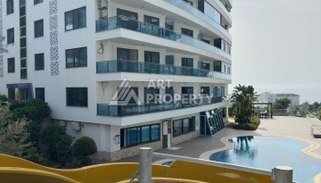 Просторная меблированная квартира 2+1 в элитном комплексе в районе Каргыджак — 300 метров до моря. - Ракурс 16