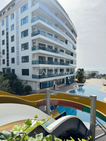 Просторная меблированная квартира 2+1 в элитном комплексе в районе Каргыджак — 300 метров до моря. - Ракурс 15