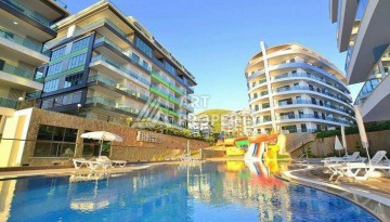 Просторная меблированная квартира 2+1 в элитном комплексе в районе Каргыджак — 300 метров до моря. - Ракурс 17