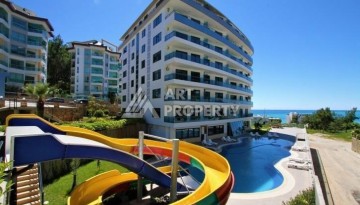 Просторная меблированная квартира 2+1 в элитном комплексе в районе Каргыджак — 300 метров до моря. - Ракурс 18