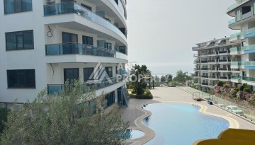 Просторная меблированная квартира 2+1 в элитном комплексе в районе Каргыджак — 300 метров до моря. - Ракурс 19