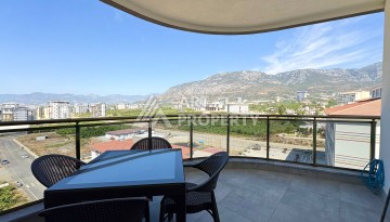 Квартира 1+1, 57 м², с видом на море, город и горы в Махмутларе - Ракурс 1