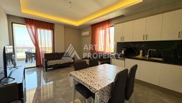 Квартира 1+1, 57 м², с видом на море, город и горы в Махмутларе - Ракурс 2