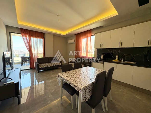 Квартира 1+1, 57 м², с видом на море, город и горы в Махмутларе - Ракурс 1