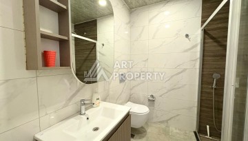 Квартира 1+1, 57 м², с видом на море, город и горы в Махмутларе - Ракурс 5