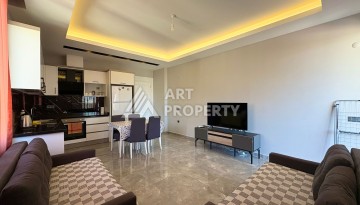 Квартира 1+1, 57 м², с видом на море, город и горы в Махмутларе - Ракурс 8