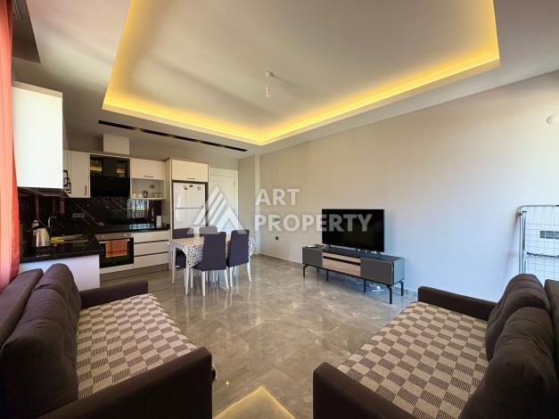 Квартира 1+1, 57 м², с видом на море, город и горы в Махмутларе - Ракурс 7