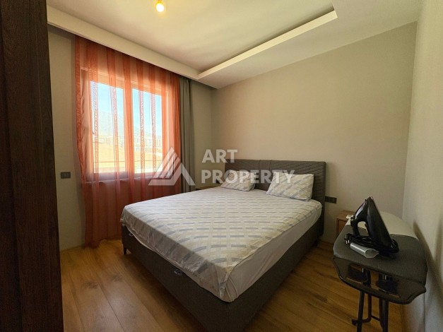 Квартира 1+1, 57 м², с видом на море, город и горы в Махмутларе - Ракурс 8